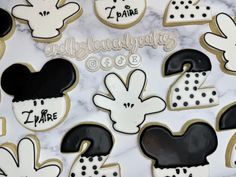 mickey mouse cookies are decorated with black and white icing