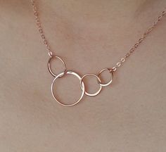 "Four eternal linked circles form the center of this beautiful necklace. The perfect 4 sisters or 4 best friends necklace/gift. Elegant. Simple. Available in silver, gold or rose gold. Overall length of all necklaces in photos is 16\". Choose the length for the necklace. These necklaces are adjustable. Your item comes in a cute gift box so you can give it as a gift - or enjoy opening it as a gift yourself! MATERIAL ------------------------------------------------- Silver: All in shiny solid ster Rose Gold Bridesmaid Jewelry, Gold Bridesmaid Jewelry, Cat Necklace Gold, Nana Necklace, 4 Best Friends, 40th Birthday Gifts For Women, Interlocking Circle Necklace, Rose Gold Circle, Rose Gold Bridesmaid