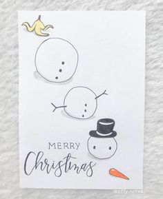 a christmas card with two snowmen on top of each other and the words merry christmas written