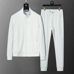 Embrace effortless luxury with this minimalist tracksuit, channeling the iconic Louis Vuitton LV aesthetic. The pristine white colorway and subtle tonal monogram pattern exude sophistication and timeless style. Crafted from premium materials, this set features a comfortable bomber-style jacket and relaxed-fit joggers, perfect for lounging or stepping out in style. Disclaimer: This product is inspired by the Louis Vuitton design and is not an official Louis Vuitton product. Lv Aesthetic, White Tracksuit, Buy Louis Vuitton, Track Suit Men, Fitted Joggers, Monogram Pattern, Bottega Veneta Shoulder Bag, Urban Outfits, Luxury Clothing