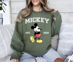 Mickey Est 1928 Sweatshirt, Mickey Hoodie, Mickey Mouse Sweater, Mickey Mouse Hoodie, Cute Mickey Sweatshirt, Mickey Mouse Gift, Mickey Gift How can I order? 1️) Please review all the information provided before placing an order 2️) Select the shirt type and size. 3️) Select the color of the shirt using the following options. 4️) Need more Items? Add the current item in the cart. And If you like to add more items to your order please press the back button and repeat steps 1-4 again. 5️) Once all Disney Mickey Mouse Sweatshirt, Cute Long Sleeve Mickey Mouse Hoodie, Micky Mouse Sweater, Mickey Mouse Sweater, Disneyland Sweatshirt, Winter Hooded Mickey Mouse Sweatshirt, Mickey Mouse Hoodie, Mickey Hoodie, Minnie Mouse Sweater