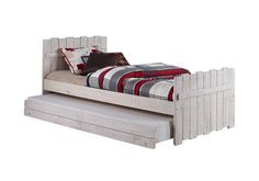 a white bed with a pull out trundle