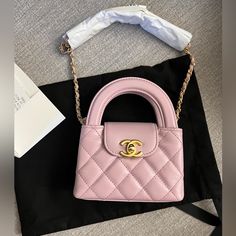 Chanel Micro Shopping Bag In The Color Rose New In Box. The Color Is A Muted Pink With A Purple Undertone. Slg Size, Does Not Fit A Phone. Bag Is 100% Authentic. Comes With Box, Dust Bag, Ribbon And Receipt. No Returns Or Exchanges, All Sales Are Final. Pink Square Box Bag With Handles, Pink Top Handle Box Bag With Dust Bag, Luxury Pink Pouch Box Bag, Pink Box Bag With Top Carry Handle For Gifts, Evening Double Handle Box Bag With Original Box, Pink Rectangular Bag, High-end Pink Box Bag With Top Handle, High-end Pink Top Handle Box Bag, High-end Pink Handheld Bag