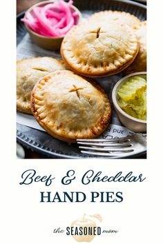 beef and cheese pies on a plate with a fork