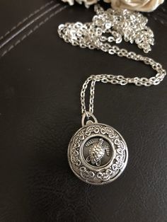 "🔸🔸orders are delayed by a few days this week. Thank you for your patience Sea turtle locket, ocean jewelry, turtle gift This antiqued silver locket has been adorned with an antiqued silver sea turtle setting inside a detailed antiqued silver bezel. This small folding spring locket is 1\" and can hold four small 3/4\" photos and hangs from 20\" of antiqued silver textured rhodium chain and lobster clasp. You can also purchase additional chain by the inch for a longer necklace during checkout. Silver Turtle Necklace For Gift, Spiritual Turtle-shaped Jewelry Gift, Spiritual Turtle Shaped Jewelry Gift, Silver Turtle Jewelry For Gifts, Silver Turtle Jewelry Gift, Elegant Silver Turtle Jewelry, Antique Silver Coin Pendant Jewelry As Gift, Nickel-free Silver Turtle Jewelry, Antique Silver Spiritual Locket Jewelry