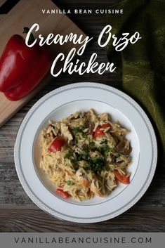 creamy orzo chicken with tomatoes and parsley in a white bowl on a wooden table