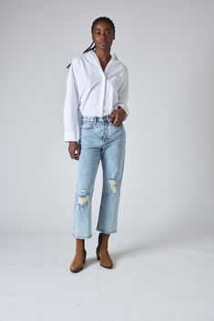 Feel nostalgic in these 90's style distressed denim pants. Keep your look casual with a loose fitting tee and sneakers, or style them up with a blouse and heels. Loose Fit Distressed Fabric Belt Loops Hits above the Ankle *These pants run a little small. We recommend you order a size up.