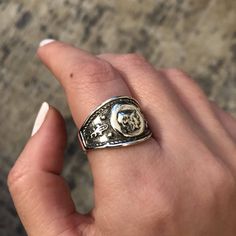 This exquisite sterling silver ring, handmade with the utmost craftsmanship, features an image of Goddess Athena, renowned as a symbol of wisdom and guardian of Athens. The entire piece is constructed of sterling silver. Evil Eye Stone, Goddess Athena, Symbol Of Wisdom, Athena Goddess, Handmade Sterling Silver Rings, Coin Ring, Handcrafted Rings, Fine Jewelry Collection, Pendant Rings