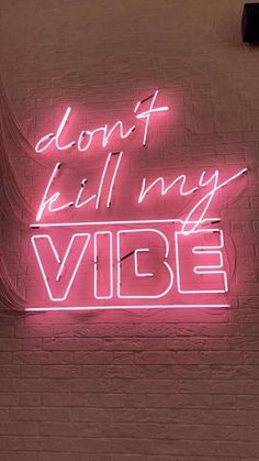 a neon sign that says don't kill my vibe