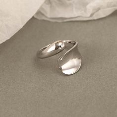 Elegant and enchanting, our 925 Silver Water Drop Slice Ring is the perfect accessory for any occasion. Made with high-quality silver, the intricate water drop design adds a touch of glamour to any outfit. Make a statement and embrace the pure beauty of this unique ring. Tarnish proof Water proof Sleep / Nap proof Safe for sensitive skin Wear it while working out &showering Designed to wear 24/7 If there is no stock, the product will take 15 days to produce Please leave your usual email address and phone number for order contact There is a discount code on the store homepage, limited to one time per person, welcome to use Details Materials: 925 Sterling Silver Weight: 3.10G Size: Adjustable SKU：AN24061402 Elegant Silver Ring With Shiny Finish, Elegant Silver Rings With Shiny Finish, Elegant Silver Water Drop Jewelry, Elegant Teardrop Rings With Polished Finish, Elegant Open Ring Jewelry With Shiny Finish, Baby Charm Bracelet, Slice Ring, Water Drop Design, Sterling Silver Nose Rings