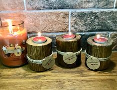 three candles sitting next to each other on a table