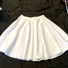 High Waisted Flare Skirt. Size X-S. Never Worn White Stretch Full Mini Skirt, White Full Mini Skirt With Stretch, White A-line Mini Skirt With Lining, White A-line Lined Mini Skirt, White Flowy A-line Mini Skirt, White A-line Flowy Mini Skirt, White Full Skort With Lined Skirt, White Full Skirt Skort With Lining, White Full Skirt Lined Skort