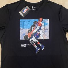 Paul George # 13 T-Shirt Nike Black Fan Apparel T-shirt, Nike Fan Apparel T-shirt For Streetwear, Nike Fan Apparel Tops For Streetwear, Black Fan Apparel T-shirt With Graphic Design, Black Nike Cotton T-shirt, Black Fan Merchandise Top With Logo Print, Black Logo Print Tops For Fan Merchandise, Black Tops With Logo Print For Fan Merchandise, Nike Black Fan Apparel Tops