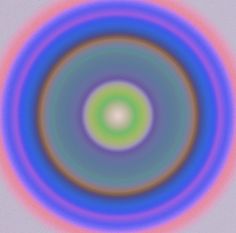 an image of a circular object that appears to be colored in blue, green and pink