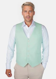 Wow the crowd in the Mint Green Linen Vest! Custom made from a breathable linen cotton blend, this pastel mint green piece will have you turning heads at any event! Step up your style game with this unique and classy suit. You can't go wrong! White Cotton Summer Suit, Tailored Solid Suits For Summer, Spring Green Formal Suit, Fitted Casual Cotton Suits, Casual Fitted Cotton Suit, Classic Spring Cotton Suit, Summer Cotton Workwear Suits, Green Cotton Formal Suits, White Cotton Suit For Spring