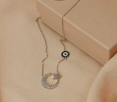 Silver Star and Crescent Necklace   ✔Handmade silver moon and star&evil eye necklace ✔925 sterling silver ✔Preserves its shine for a long time ✔Ready for shipping Necklace  Material: 925 Sterling Silver Gemstone: Zircon Stone Width: 1.40 cm-0.55 in. Height: 1.10 cm-0.43 in. Weight: 1.88 gr You may choose it as a gift.🤍 If you have a question please don't hesitate to contact me.  YOU MAY USE THE EXPRESS SHIPPING OPTION TO GET YOUR ORDER FASTER. Express shipping send by UPS, TNT, and FedEx. Delivery time:  *Europe 2-4 business days, *USA- Canada 3-7 business days, *Everywhere else 5-10 business days. **Please share your phone number with me in case of cargo returns. Feel free to view my other accessories; https://www.etsy.com/shop/aliveaccessories Thank you for visiting my shop! Turkish Flag, Crescent Necklace, Silver Moon, Evil Eye Necklace, Moon Star, Eye Necklace, Silver Stars, Necklace Handmade, Necklace Gift