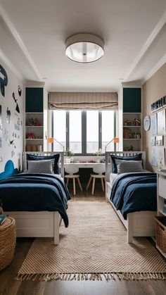 two beds in a room with wooden floors and blue sheets on them, one is made up