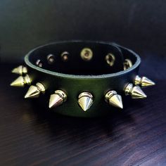 This is a Punk Silver Spike Bracelet. It's a gift for men or women. This will be a perfect gift for your friends. This product is handmade and takes 1 day to make. It will be shipped as soon as possible on the next day. If you have any questions, please contact us with Etsy message. Free Shipping Over $35. All orders have tracking number. Thank you so much : ) Punk Jewelry With Rivets As Gift, Punk Jewelry With Rivets For Gift, Black Spiked Festival Bracelets, Black Spiked Bracelets For Festival, Black Bracelets With Rivets As Gift, Black Festival Bracelets With Spikes, Metal Bracelets With Rivets For Gift, Metal Rivets Bracelets As Gift, Punk Style Bracelets