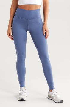 Running errands and hitting the trails will be comfortable even in cooler temps with high-waisted leggings featuring a cozy fleece interior and side pockets. The leggings are designed with a wide waistband that's easy to pull on, roomy side pockets for storing small essentials and banded cuffs. 29" inseam; 9" leg opening; 11" front rise; 14" back rise (size Medium) Side envelope pockets; side hidden-zip pocket Fleece lining 79% polyester, 21% spandex Machine wash, tumble dry Imported Outdoor Stretch Activewear With Comfort Waistband, Blue Stretch Activewear For Outdoor Activities, Blue Stretch Activewear For Outdoor, Compressive Athleisure Leggings For Outdoor, Midweight Casual Workout Leggings, Casual Solid Midweight Leggings, Tight Outdoor Leggings For Athleisure, Midweight Blue Sports Bottoms, Blue Stretch Activewear With Ribbed Waistband