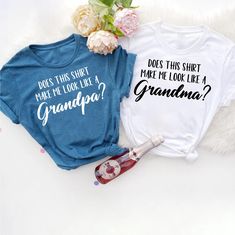 New Grandma Grandpa Shirt,Promoted to Grandma Gift,Baby Announcement Tee,Funny Grandparents Tshirt,Pregnancy Reveal Gift,Matching Shirts THANK YOU FOR CHOOSING US! -----PRODUCT INFORMATION OF T-SHIRT----- 1) Solid colors: 100% Cotton or 95% cotton. 2) Heather colors: Cotton + Polyester.(BLEND) 3)Black text/design will be printed on Light color shirts 4)White text/design will be printed on Dark color shirts ----PRODUCT SHIPPING ----- 1)Processing is 1-3 days. 2)First Class Shipping is 2-5 busines Blue Tops With Funny Print For Family Matching, Funny Text Print Tops As Gift, Grandparent Gender Reveal Shirts, Funny Blue Top With Custom Print, Family Matching Tops With Letter Print For Gender Reveal, Short Sleeve Tops For Gender Reveal With Funny Text, Blue Family Matching Tops With Funny Print, Funny Letter Print Tops For Gifts, Funny Letter Print Tops For Gift