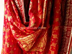 Express shipping! A very beautiful red colour Sada Saubhagyawati Bhava rich Banarsi Ghatchola silk golden zari woven dupatta. This dupatta also has Bandhani hand tie dye design. It can be used for wedding dupatta, Odhani, with festival outfits, Lehenga dupatta, it is a multipurpose dupatta which goes with most of the things and occassions. It can also be used to gift to someone. This is a zari woven dupatta with full length there is no print on it. Dimension: Length: 2.5 meter Width: 1.04 meter Red Raw Silk Anarkali Set With Dupatta, Red Unstitched Anarkali Set With Dupatta, Festive Red Anarkali Set With Dupatta, Red Sharara With Dupatta In Chanderi, Red Chanderi Sharara With Dupatta, Red Raw Silk Traditional Wear With Sheer Dupatta, Red Art Silk Anarkali Set With Gota Work, Red Anarkali Chanderi Dupatta, Red Chanderi Anarkali Dupatta