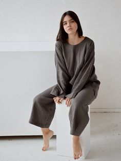 "Weathered wood culottes linen pants for woman. Midi loose flared pants with pockets. Choose size: XS Waist 66 - 68 cm. / (26\" - 26 3/4\") Hips 90 - 92 cm. / (35 1/2\" - 36 1/4\") S Waist 70 - 72 cm. / (27 3/4\" - 28 1/4\") Hips 94 - 96 cm. / (37\" - 37 3/4\") M Waist 74 - 76cm. / (29 1/4\" - 30\") Hips 98 - 100 cm. / (38 1/2\" - 39 1/4\") L Waist 78 - 80 cm. / (30 3/4\" - 31 1/2\") Hips 102 - 104 cm. / (40 1/4\" - 41\") XL Waist 82 - 84 cm. / (32 1/4\" - 33\") Hips 106 - 108 cm. / (41 3/4\" - Linen Wide Leg Pants For Fall, Fall Linen Wide Leg Pants, Oversized Linen Bottoms With Pockets, Baggy Linen Wide Leg Pants For Fall, Baggy Linen Wide Leg Pants For Loungewear, Baggy Linen Wide Leg Lounge Pants, Flared Linen Pants, Loose Linen Pants, Linen Culottes