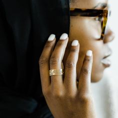 Inspired by the naturally occurring illusion of a mirage in the desert, this Arizona-inspired ring features staggered cut-through lines on a thick band to emulate the fluttering image of the surrounding area of the desert. This piece delivers a timeless and unique design meant for everyday wear. The word 'mirage' is a French-created word that translates to "to look at or to wonder at". Materials & Warranty 18K Gold Plating on pure stainless steel Hypoallergenic | Sensitive-skin friendly Waterpro Modern Adjustable Midi Rings For Promise, Modern Adjustable Stackable Promise Rings, Modern Stackable Wide Band Jewelry, Minimalist Wide Band Stackable Jewelry, Modern Wide Band Stackable Promise Rings, Modern Wide Band Promise Ring, Modern Stackable Midi Rings For Promise, Modern Adjustable Stackable Wide Band Ring, Minimalist Promise Bands