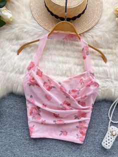 One Size: Length:48cm(with strap), Chest:80-90cmAge: 25-34Style: Sexy & ClubClothing Length: RegularMaterial: AcetatePattern Type: FloralDecoration: Backless&ltp&gtFabric Type: Blended&lt/p&gt&ltbr/&gt&ltp&gtGender: Women&lt/p&gt&ltbr/&gt&ltp&gtItem Type: Tops&lt/p&gt&ltbr/&gt&ltp&gtElasticity: High Strecth&lt/p&gt&ltbr/&gt&ltp&gtSKU:[JM11149]&lt/p&gt&ltbr/&gt Summer Party Halter Top Camisole, Summer Stretch Halter Neck Camisole, Fitted Strapless Pink Camisole, Feminine Sleeveless Halter Top For Summer, Feminine Sleeveless Strapped Crop Top, Feminine Sleeveless Crop Top With Straps, Summer Stretch Halter Top With Straps, Flirty Fitted Halter Neck Tank Top, Pink Summer Halter Top With Built-in Bra