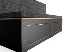 an image of a black and gold bed with drawers on the bottom side, in front of a white background