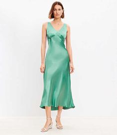 In fluid woven satin and cut on a flattering bias, this double-V dress does love-forever Hollywood glam with modern-minimalist flair. V-neck and back. Sleeveless. Back zip. Lined.,Hit:Hit: Midi - Hits at mid-calf,Imported:Imported,Fit:Fit: Swing - fits loose and swingy,Length:37 1/2" from top back neck to hem, measured from a size 8/M,Fabrication:Shell: 100% Viscose, Lining: 100% Polyester,Garment Care:Machine Washable Loft Satin Double V Bias Midi Dress Size 8 Deep Grass Green Women's by Loft S Extra Dresses, Bias Dress, V Dress, Bias Cut Dress, Midi Slip Dress, Formal Dresses Short, Sleeveless Dress Summer, Hollywood Glam, Dress Satin