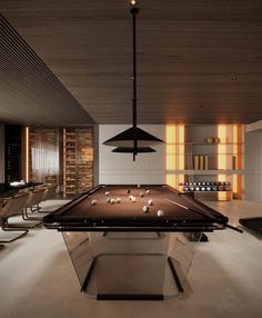 a pool table in the middle of a room