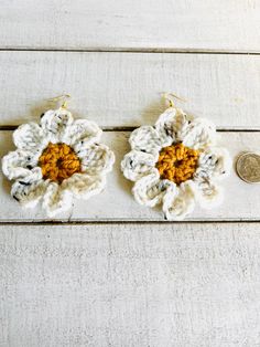 Crocheted with cotton thread the flowers are about 3 inches wide! They are added to sterling silver or gold plated fish hook earrings and close with a plastic push backing. They are very light weight and super comfortable to wear! Please note!! * As each item is handmade, please allow for slight variations in products. Each is unique and made with extreme care and craftsmanship!  * The color may vary a little bit due to screen settings. * Attention to detail is always my priority. * Each item is Handmade Daisy-shaped Earrings For Gifts, Daisy Earrings Crochet, Daisy-shaped Earrings For Summer, Cherry Hill, Crochet Daisy, Daisy Earrings, Small Cat, Fish Hook Earrings, Crafting Supplies