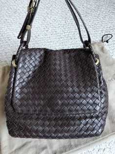 Bottega Veneta Handbag. Condition is Pre-owned. Shipped with USPS Priority Mail. Designer Tote Shoulder Bag With Interwoven Design, Designer Bags With Interwoven Design For Shopping, Designer Shoulder Bag With Interwoven Design For Shopping, Designer Formal Bags With Interwoven Design, Designer Top Handle Shoulder Bag With Interwoven Design, Designer Travel Shoulder Bag With Interwoven Design, Designer Brown Bag With Woven Leather, Luxury Shoulder Bag With Interwoven Design For Daily Use, Designer Travel Bags With Interwoven Design