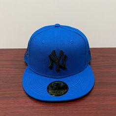 Brand - New Era Hat Model - 59fifty Hat Type - Fitted Team - New York Yankees 1999 World Series Color - Blue & Black Condition- Brand New Sizes Available; 7 1/2, 7 3/8, 7 5/8, 7 7/8 Blue Snapback Fitted Hat For Streetwear, Blue Flat Brim Hat For Streetwear, Sports Blue Snapback Hat With Flat Crown, Blue Snapback Hat With Flat Crown For Sports, Blue Snapback Hat For Sports Events, Blue Flat Crown Snapback Hat For Sports Events, Blue Flat Cap For Sports, Blue Fitted Hat With Flat Brim For Streetwear, Blue Curved Brim Fitted Hat For Streetwear