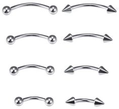 six different types of metal nose piercings with balls and spikes on each one side