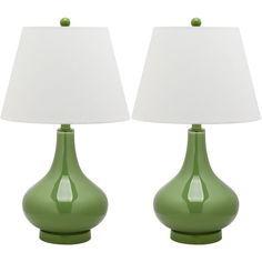 two green lamps sitting next to each other on top of a white table lamp shade