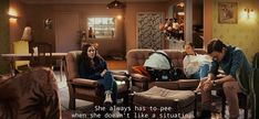 three people sitting on couches in a living room with the caption she always has to pee when she doesn't like a situation