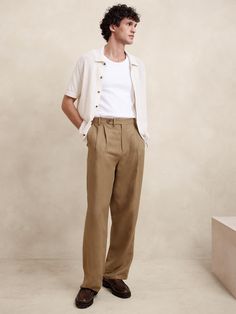 This relaxed pant is expertly cut with a wide leg and puddle hem in a beautiful linen-blend fabric we sourced from Italy, one we selected for its subtle texture and exceptional drape.  Relaxed fit: Mid rise.  Wide leg with extra length for a break at the hem Fabric from Italy's Lanificio Comatex.  Zip-fly with button closure.  Belt loops.  Front and back pockets.  Half lined (lined to the knee).  Wide-leg fit: Mid rise.  Tailored for the at-ease fit of traditional trousers, but with the extra wi Academia Summer Outfit, Trousers Outfit Men, Mens Linen Outfits, Linen Pants Outfit, Pants Outfit Men, Linen Blend Pants, Mens Outfit Inspiration, Mens Linen, How To Hem Pants