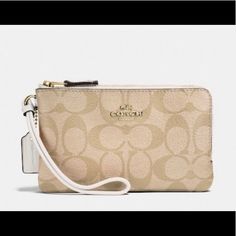 Nwt Coach Double Zip Wallet In Signature Canvas. Signature Coated Canvas. 2 Credit Card Slots. Inside Open Pockets Double Zip Closure, Fabric Lining Wrist Strap Attached Fits Iphone Or Android Im/Light Khaki/Chalk Great Gift. Perfect When You Don’t Want To Carry Your Usual Bag. Chic Beige Travel Wallet, Chic Cream Everyday Wallets, Coach Beige Bag With Zipper Pouch, Coach Cream Clutch Bag, Beige Pouch Wallet With Interior Card Slots, Chic Beige Wallet With Zipper Closure, Chic Beige Wallets With Zipper Closure, Elegant Beige Wallet With Zipper Pouch, Elegant Beige Wallets With Zipper Pouch