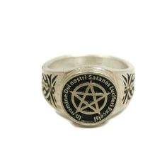 This ring was designed with the Satan's Invocation symbol. The beautiful pewter ring is a silver color and the background is blackened to bring out the fine detail of the design. Our rings are 100% Lead and nickel free pewter and made in the USA The top design part of the ring measures about 15 mm in diameter The ring band tapers from about 15mm to about 4.5mm at the bottom and is about 1.75mm thick Rings are available in sizes 7 to 14 Adjustable Silver Gothic Rings, Gothic Silver Engraved Ring, Silver Gothic Engraved Rings, Symbolic Black Rings With Oxidized Finish, Silver Adjustable Symbolic Skull Ring, Adjustable Black Symbolic Signet Ring, Silver Oxidized Skull Ring, Symbolic Silver Skull Ring, Silver Symbolic Skull Ring