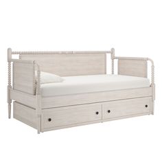 a white bed with drawers underneath it on a white background and the bottom drawer is open