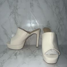 Size 10 Off White Classic White Sandals With 4-inch Heel, Casual White Heels For Spring, White Sandals With 4-inch Heel For Spring, Classic White High Heel Sandals, White Open Toe Casual Heels, Casual White Pointed Toe Sandals, Casual White Heels With Cushioned Footbed, White Platform Heels In Trendy Style, White Cushioned Slip-on Heels