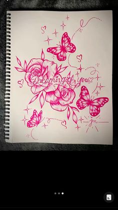 a drawing of roses and butterflies with the words i love you written in pink ink