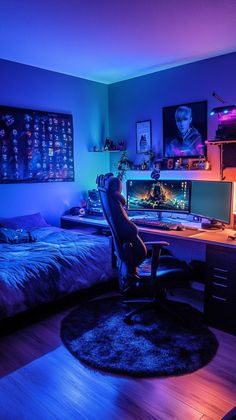 a bedroom with a bed, desk and computer monitor in the corner at night time