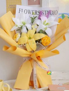 a bouquet of flowers sitting on top of a table