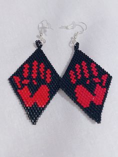 Pair of Black and red hand print earrings paying tribute to MMIW. Handmade Symbolic Black Earrings, Symbolic Black Earrings For Gift, Red Hand Print, Native American Quilt Patterns, Navajo Wedding, Red Hands, Native American Quilt, Native American Wedding, Wedding Red