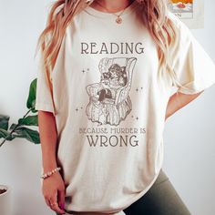 Get ready to be OBSESSED with your new reading shirt. It's the cutest and most trendy way to combine all those important trendy light academia and victorian aesthetic vibes! This is the perfect bookish shirt!  * Q U I C K * F A C T S * ✺  All shirts are UNISEX ✺  100%  ringspun cotton (fiber content may vary for different colors) ✺  Soft-washed, garment-dyed fabric brings extra coziness ✺  Wash and dry normally (on cool for best results) ✺  Sewn-in twill label * S I Z I N G * ✺ For an oversized fit, select two or three sizes up from your normal size ✺ Model is wearing size L  ✺ Sizing runs true to size ✺ Relaxed fit ✺ Most women find their typical size works best, since they are meant to fit a touch loose ✺ See Size guide and fit in images          * S H I P P I N G * T I M E S * ✺ Our ite Bookish Relaxed Fit Graphic Print Top, Literary Style Short Sleeve Screen Print Tops, Screen Print Short Sleeve Tops, Bookish Crew Neck Shirt With Graphic Print, Bookish Text Print Tops For School, Relaxed Fit Graphic Print Shirt In Bookish Style, Relaxed Fit Graphic Print Shirt With Bookish Style, Bookish Crew Neck Shirt With Text Print, Bookish Cotton Shirt With Graphic Print