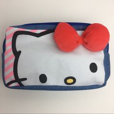 Hello Kitty- Soft, Denim Blue, Dual Compartment, Cosmetic Bag Detailed With Embroidery And A Red 3d Bow. Great Accessory For The Hello Kitty Fan. Brand New, Never Used. Dimensions: L: 8"X W: 2.5" X H: 4.75" Sanrio Bags, Sanrio Bag, Denim Blue, Cosmetic Bag, Blue Denim, Coin Purse, Hello Kitty, Bag Lady, Kitty