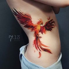 an image of a woman's stomach with a bird tattoo on her side and the words instagram