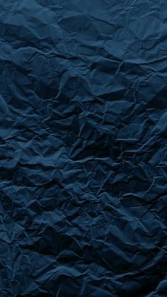 an image of blue crumpled paper background